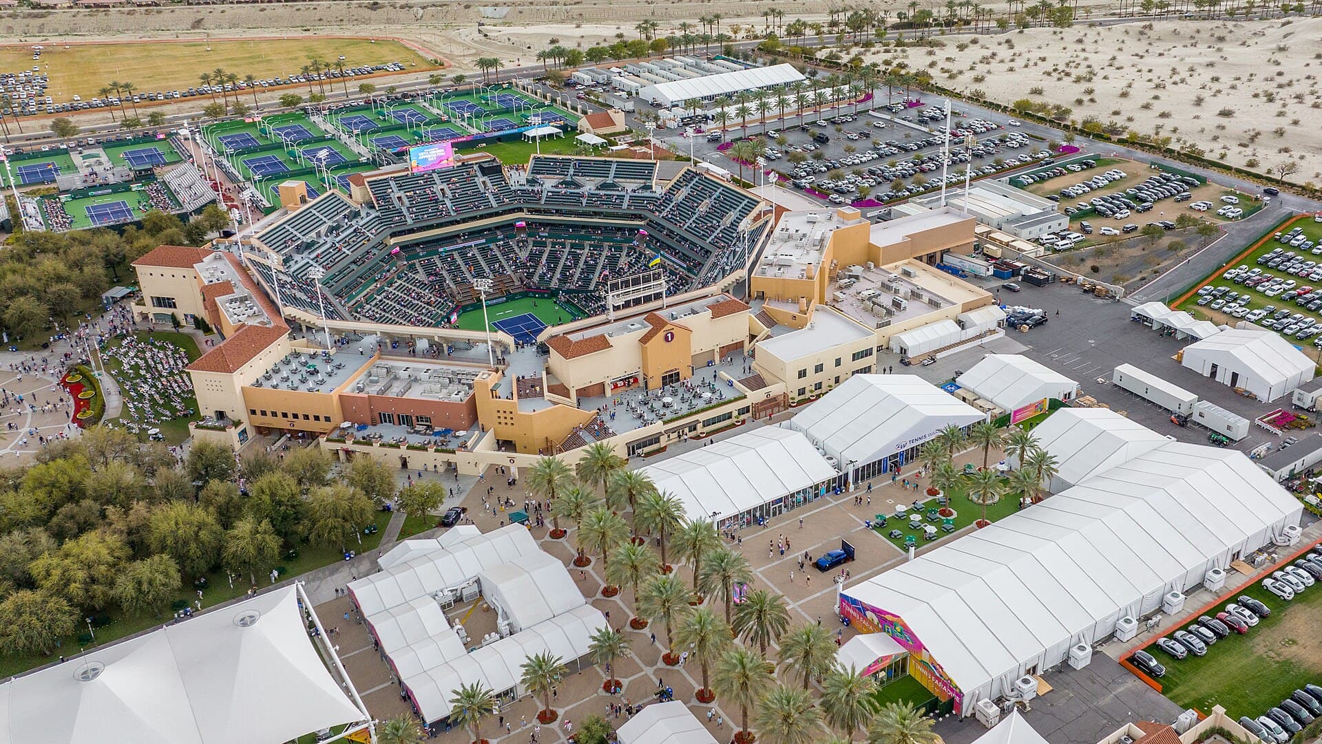 Aerial view of the stadium and blue courts at Indian Wells Tennis Garden.