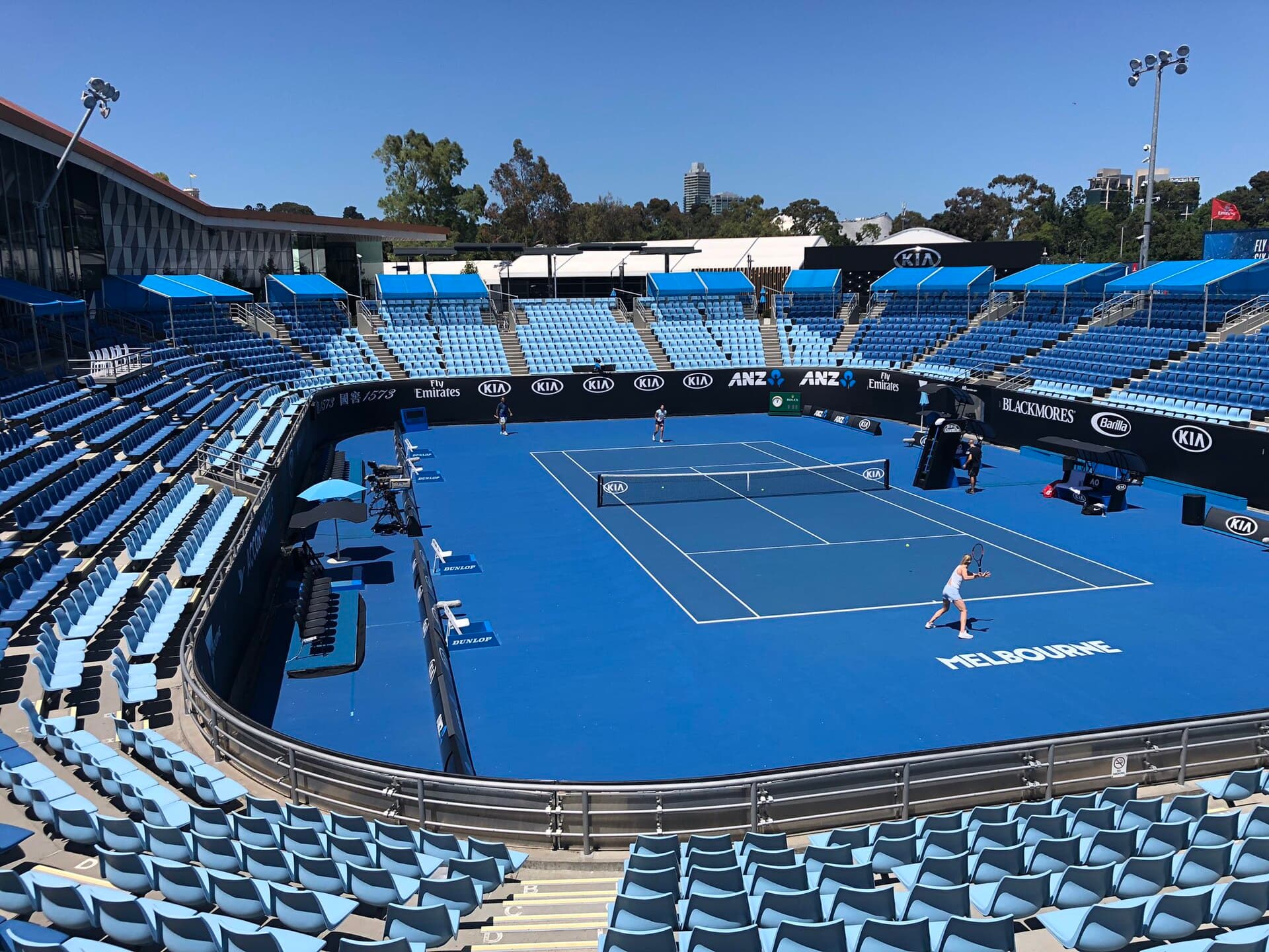 Blue tournament court and blue seating at Melbourne Park Show Court 2.