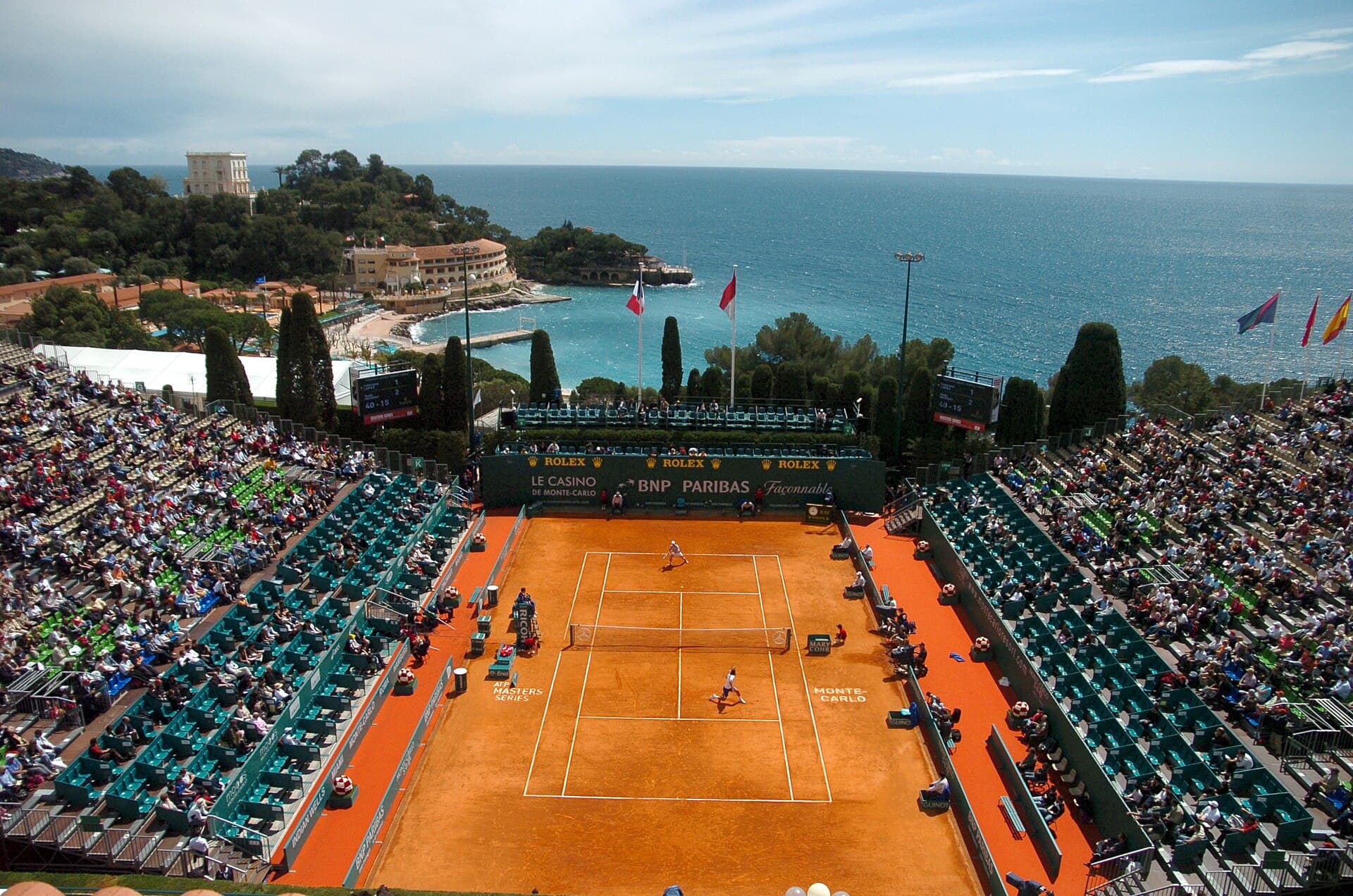 Clay stadium court at Monte-Carlo Country Club overlooking the Mediterranean.